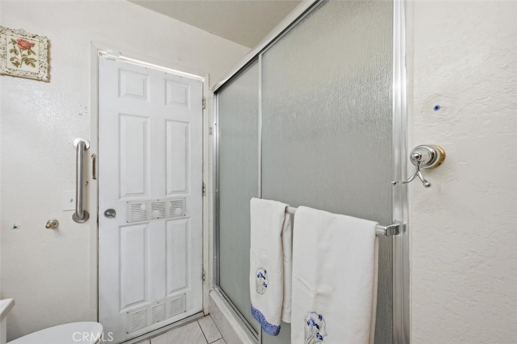 6266 Shaker Drive Riverside, CA 92506 - Photo 31 of 72 Downstairs full bathroom with door access leading to the pool/spa