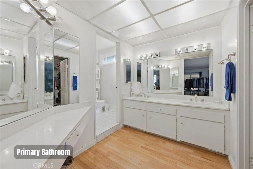 6266 Shaker Drive Riverside, CA 92506 - Photo 37 of 72 a spacious bathroom with a double vanity sink shower and a mirror