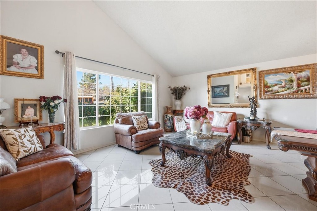 6266 Shaker Drive Riverside, CA 92506 - Photo 5 of 72 a living room with furniture and a large window