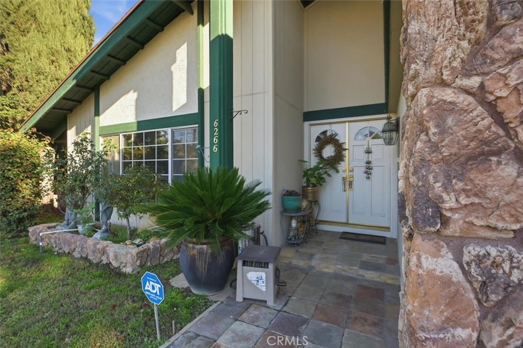 6266 Shaker Drive Riverside, CA 92506 - Photo 52 of 72 a front view of a house with a garden