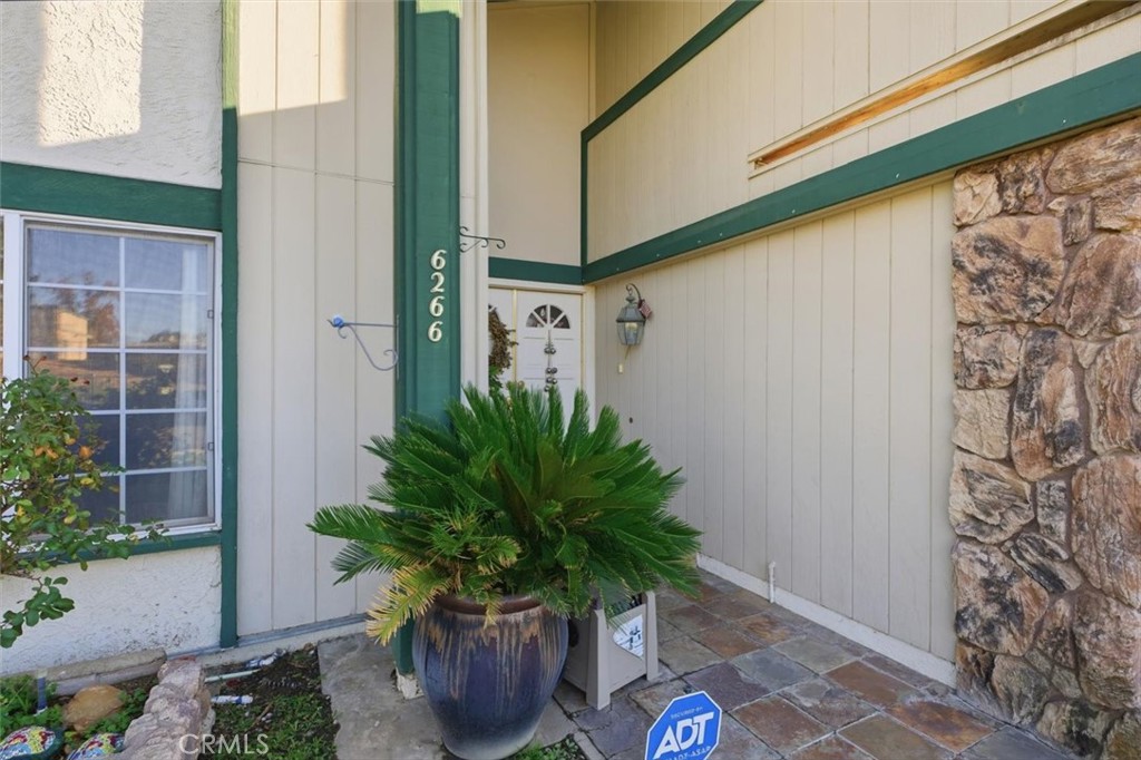 6266 Shaker Drive Riverside, CA 92506 - Photo 53 of 72 a potted plant sitting in front of a door