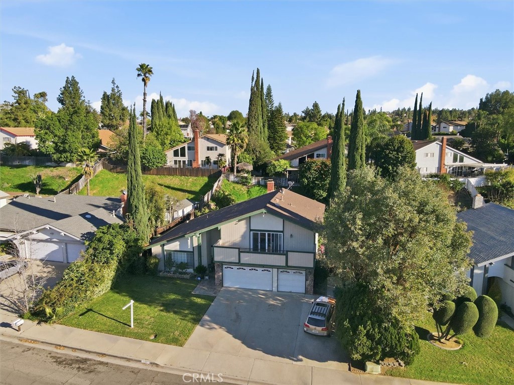6266 Shaker Drive Riverside, CA 92506 - Photo 63 of 72 front view of a house with a garden