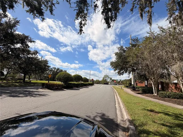 a view of street with houses