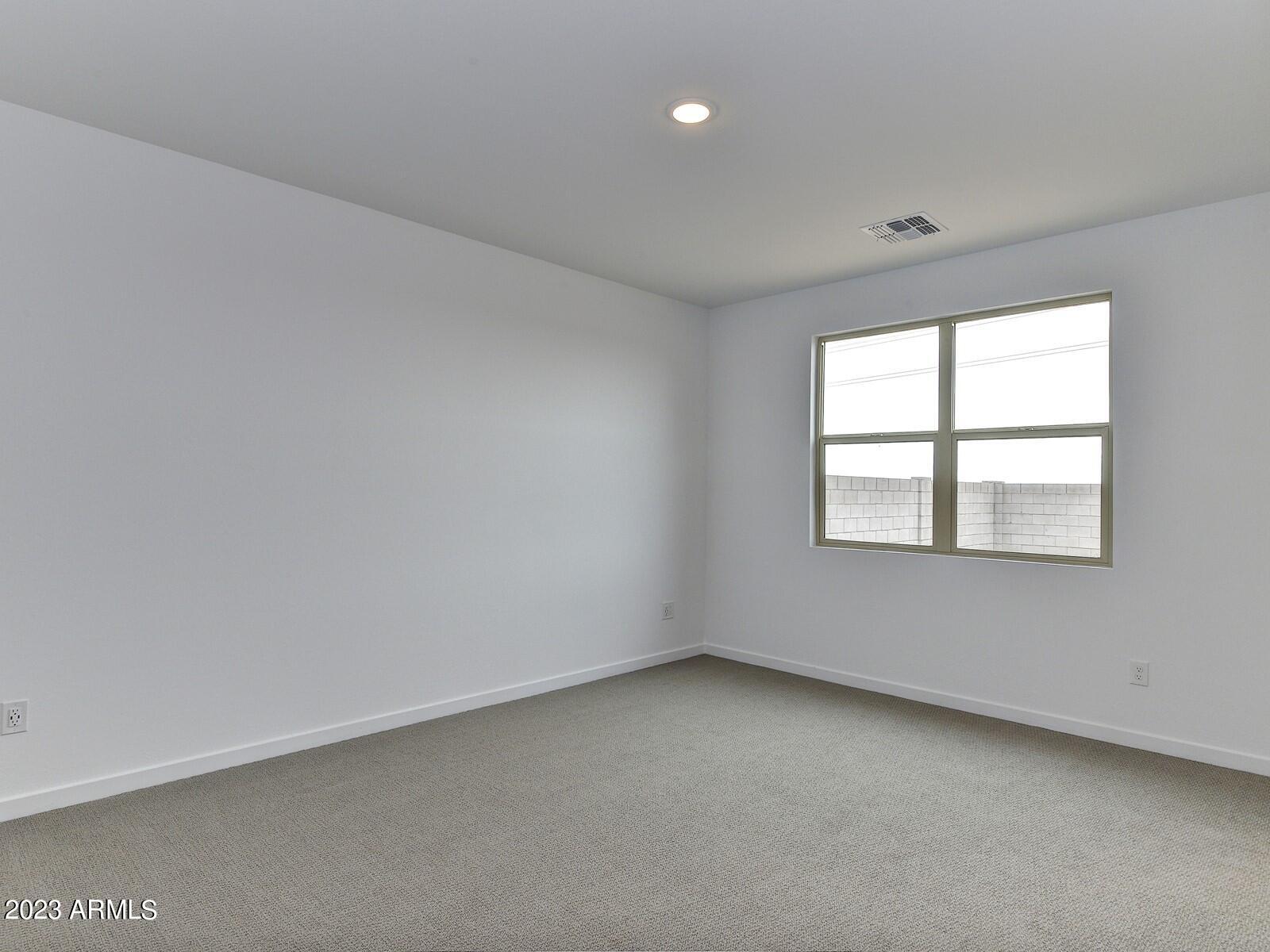 21825 North Rummler Lane Maricopa, AZ 85138 - Photo 12 of 24 012_Primary Bedroom
