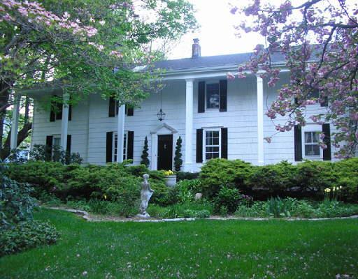 79 Haviland Road Ridgefield, CT 06877 - Photo 1 of 1 a front view of a house with a yard