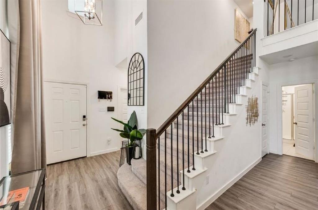 3911 Rochelle Lane Crandall, TX 75114 - Photo 4 of 16 a view of entryway and hall with wooden floor