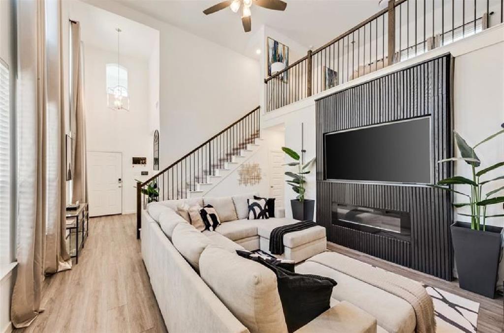 3911 Rochelle Lane Crandall, TX 75114 - Photo 6 of 16 a living room with furniture and a flat screen tv