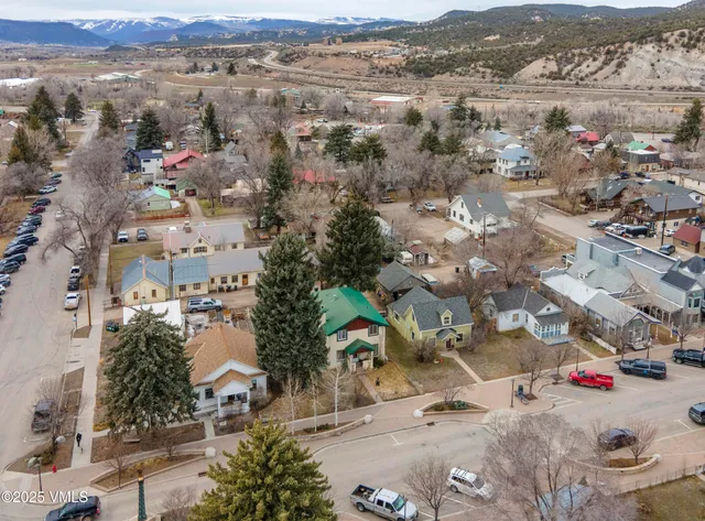 an aerial view of a city with lots of residential buildings