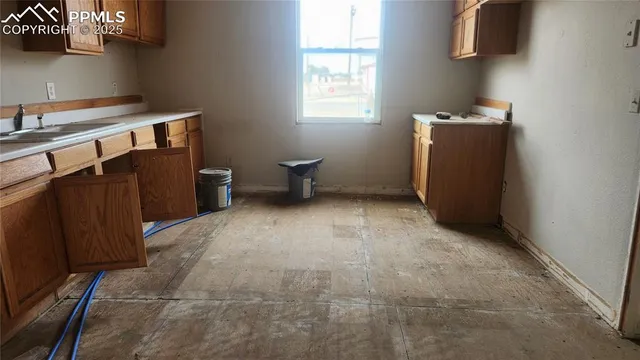 an empty room with windows