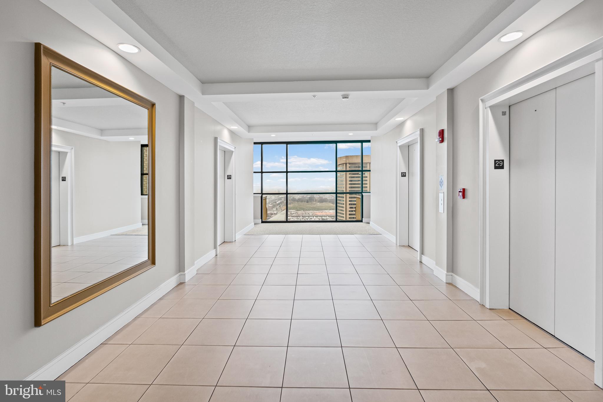 414 Water Street, Unit 2903 Baltimore, MD 21202 - Photo 2 of 46 a view of an empty room and window
