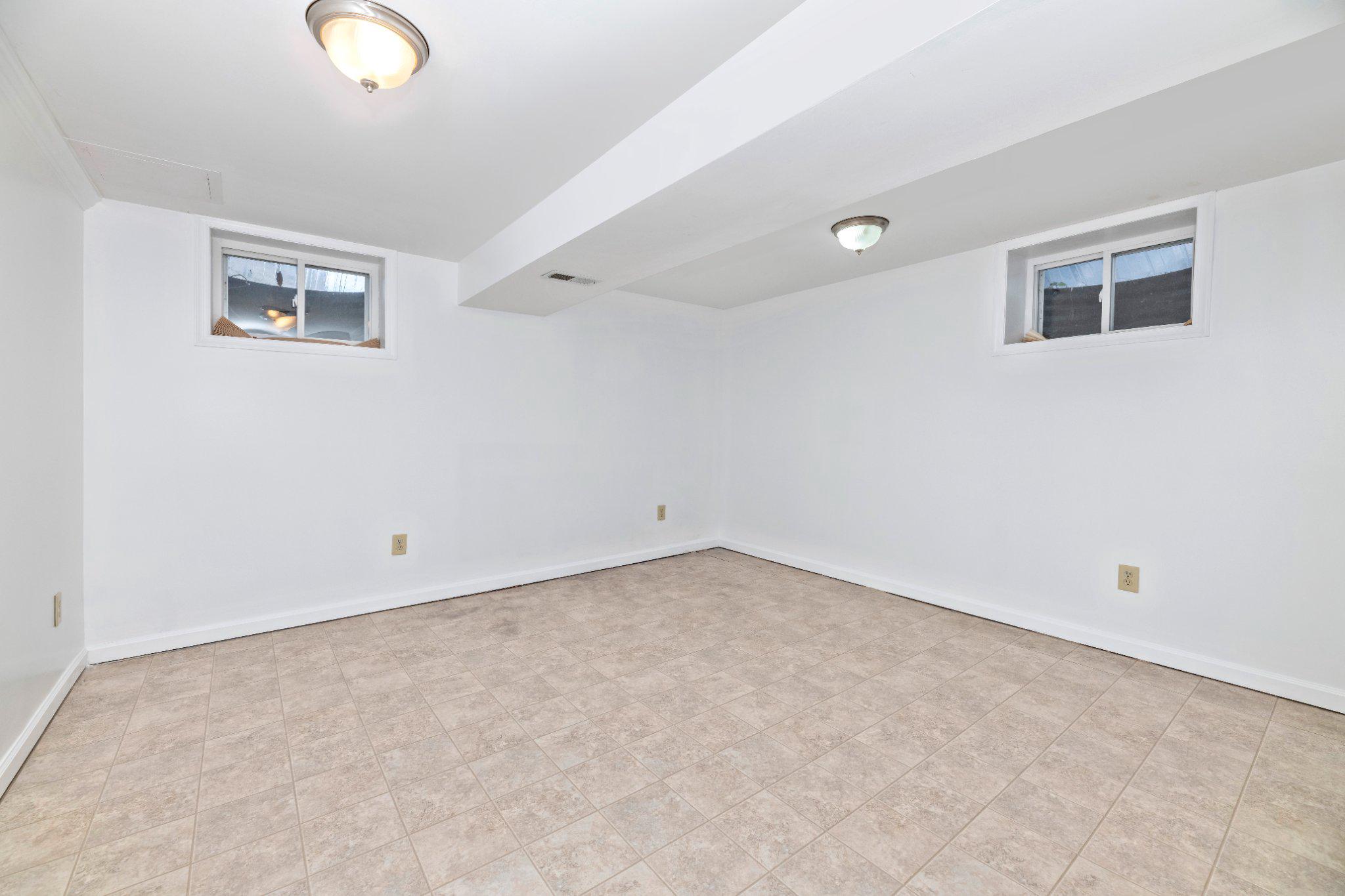 7927 Old Seventh Street Frederick, MD 21702 - Photo 17 of 19 Spacious, versatile basement den.