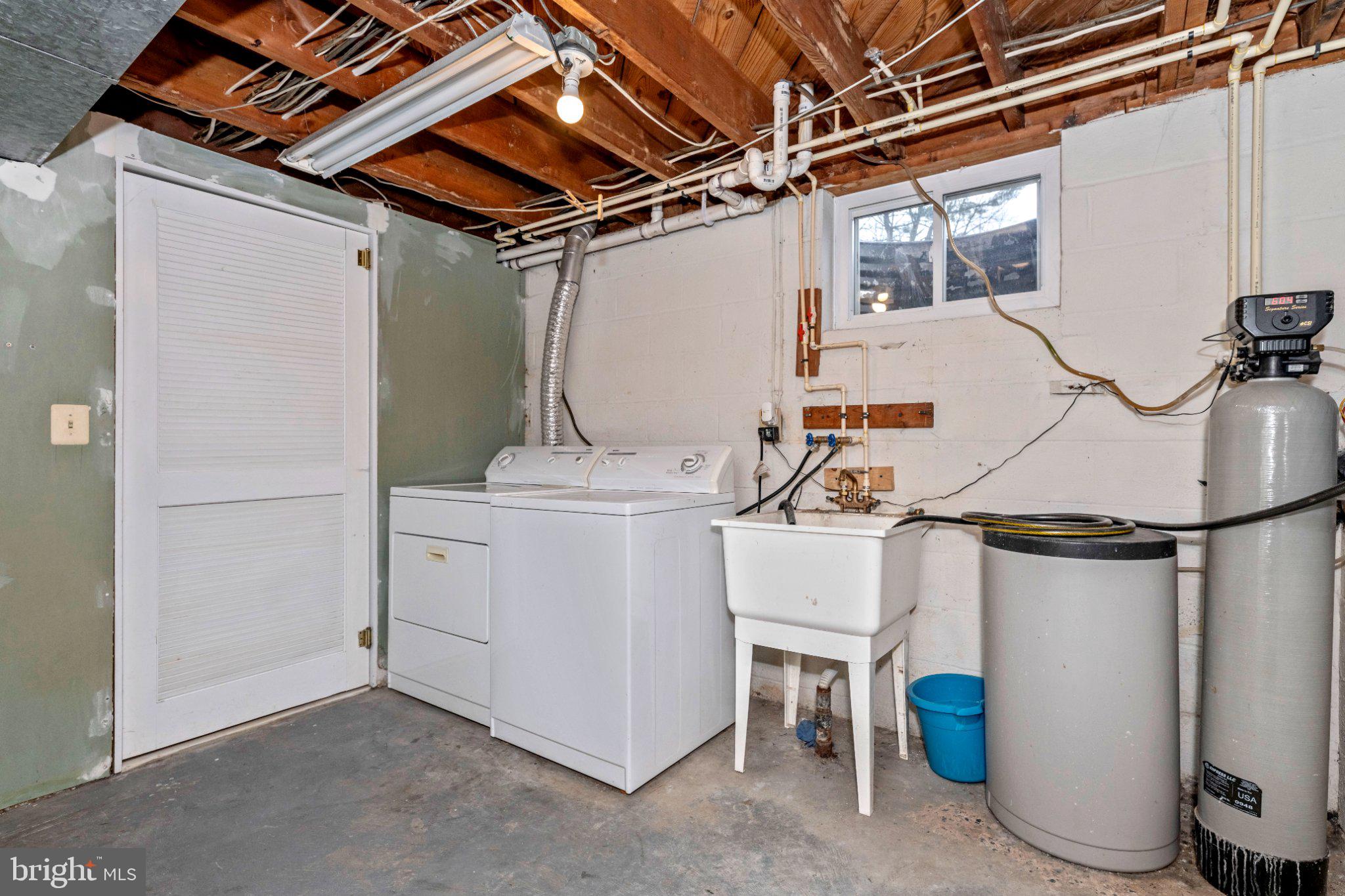 7927 Old Seventh Street Frederick, MD 21702 - Photo 18 of 19 Functional basement laundry area.
