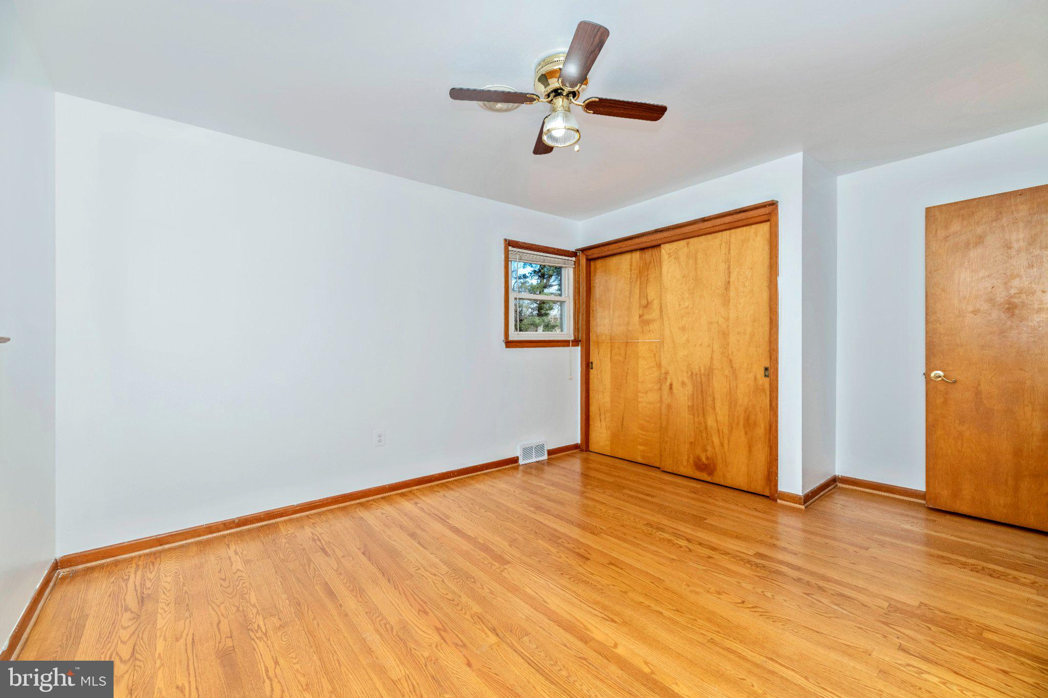 7927 Old Seventh Street Frederick, MD 21702 - Photo 10 of 19 Bright and airy room with wood accents.