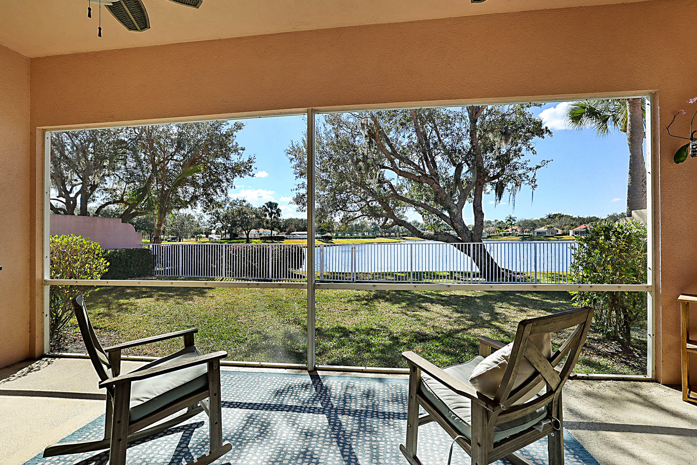 1226 Southwest Eagleglen Place Stuart, FL 34997 - Photo 2 of 45 a view of a swimming pool with a patio