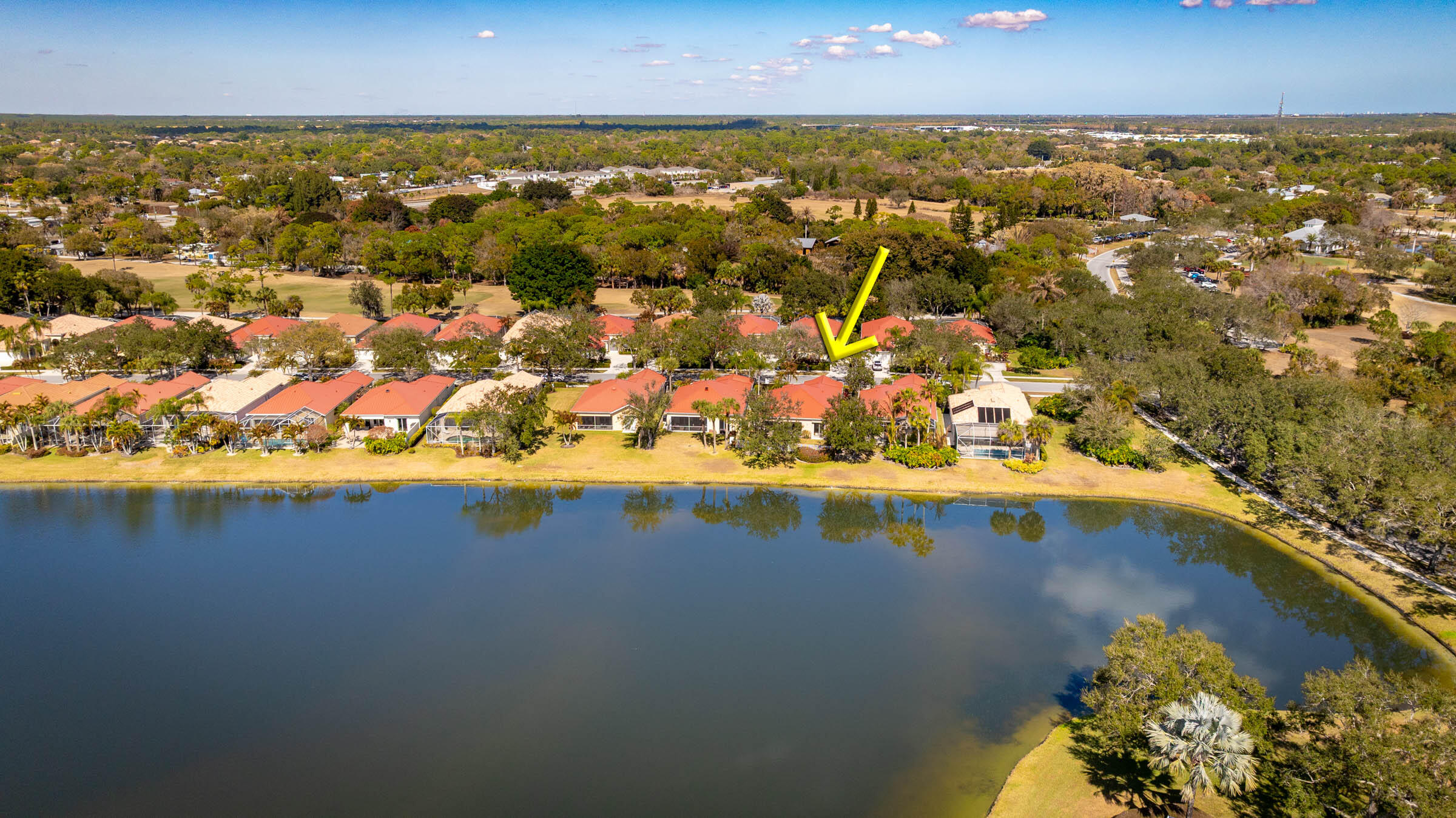 1226 Southwest Eagleglen Place Stuart, FL 34997 - Photo 42 of 45 an aerial view of residential houses with outdoor space
