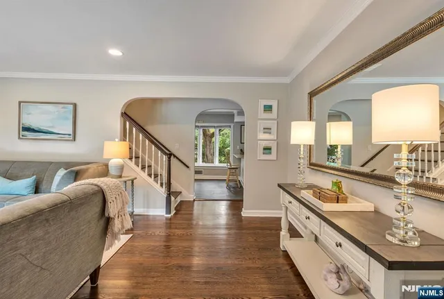 a spacious bathroom with a double vanity sink and a large mirror