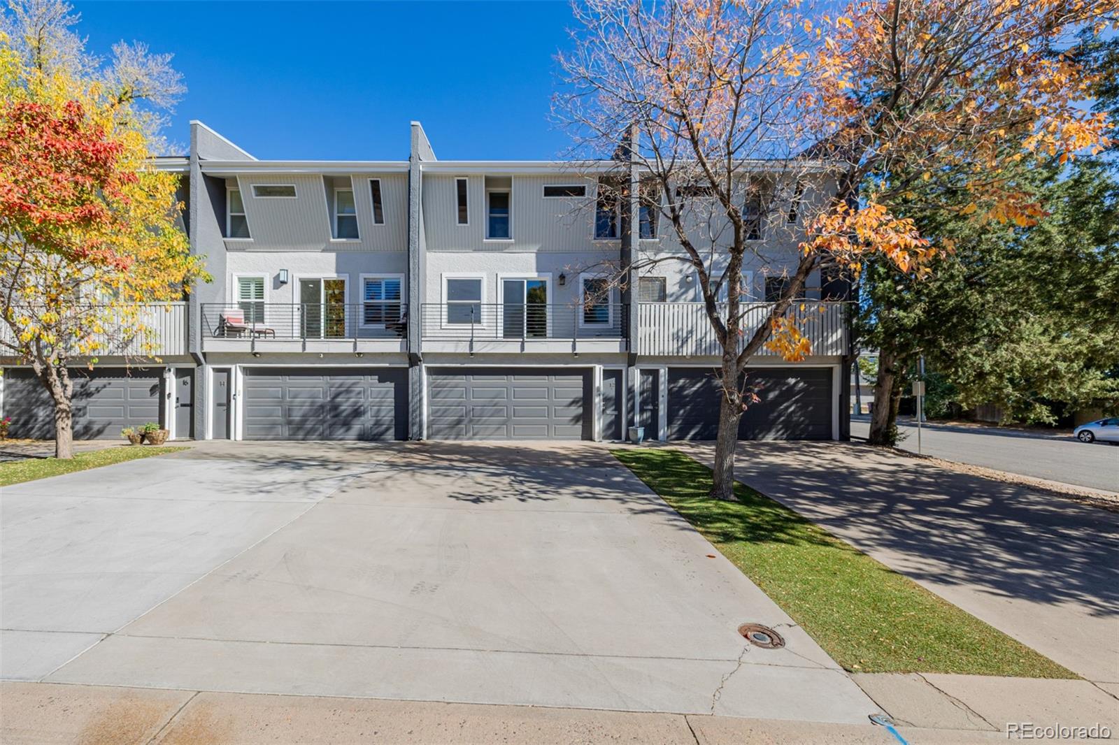 12 Jackson Street Denver, CO 80206 - Photo 1 of 48 a view of a house with wooden fence
