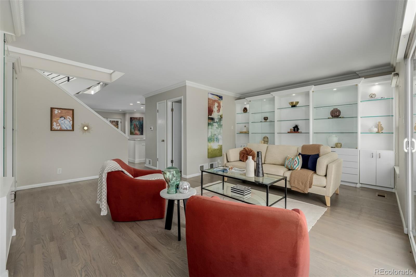 12 Jackson Street Denver, CO 80206 - Photo 11 of 48 a living room with furniture rug and lamp