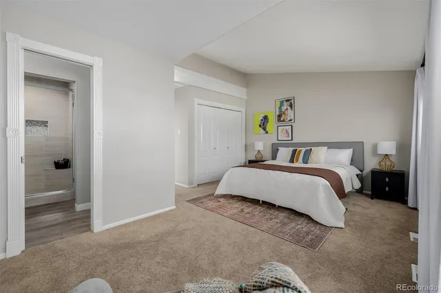 a bedroom with a bed and walk in closet