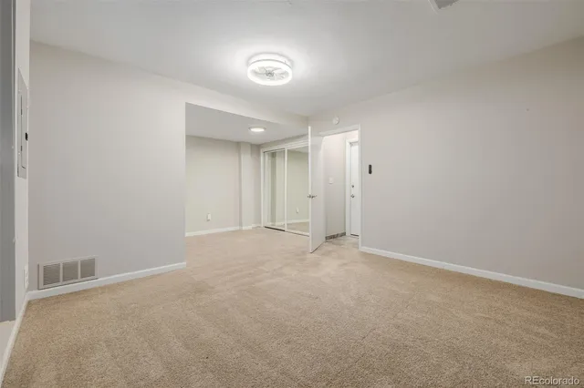 an empty room with an entryway