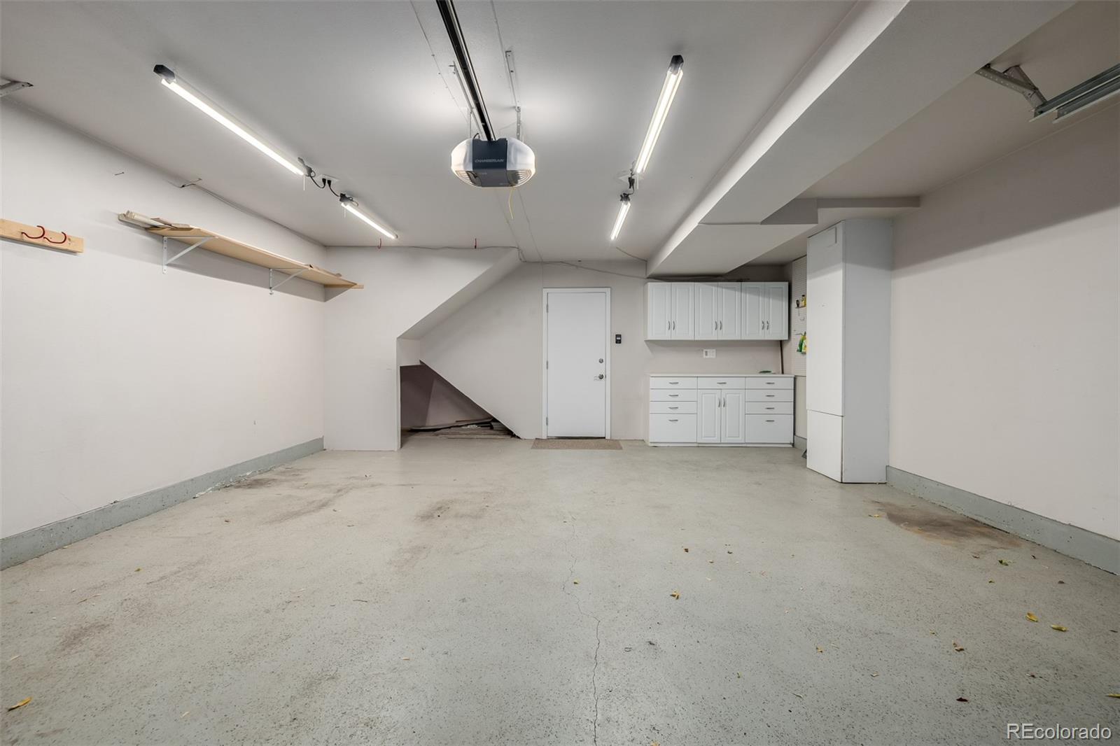 12 Jackson Street Denver, CO 80206 - Photo 26 of 48 an empty room with a empty space and windows