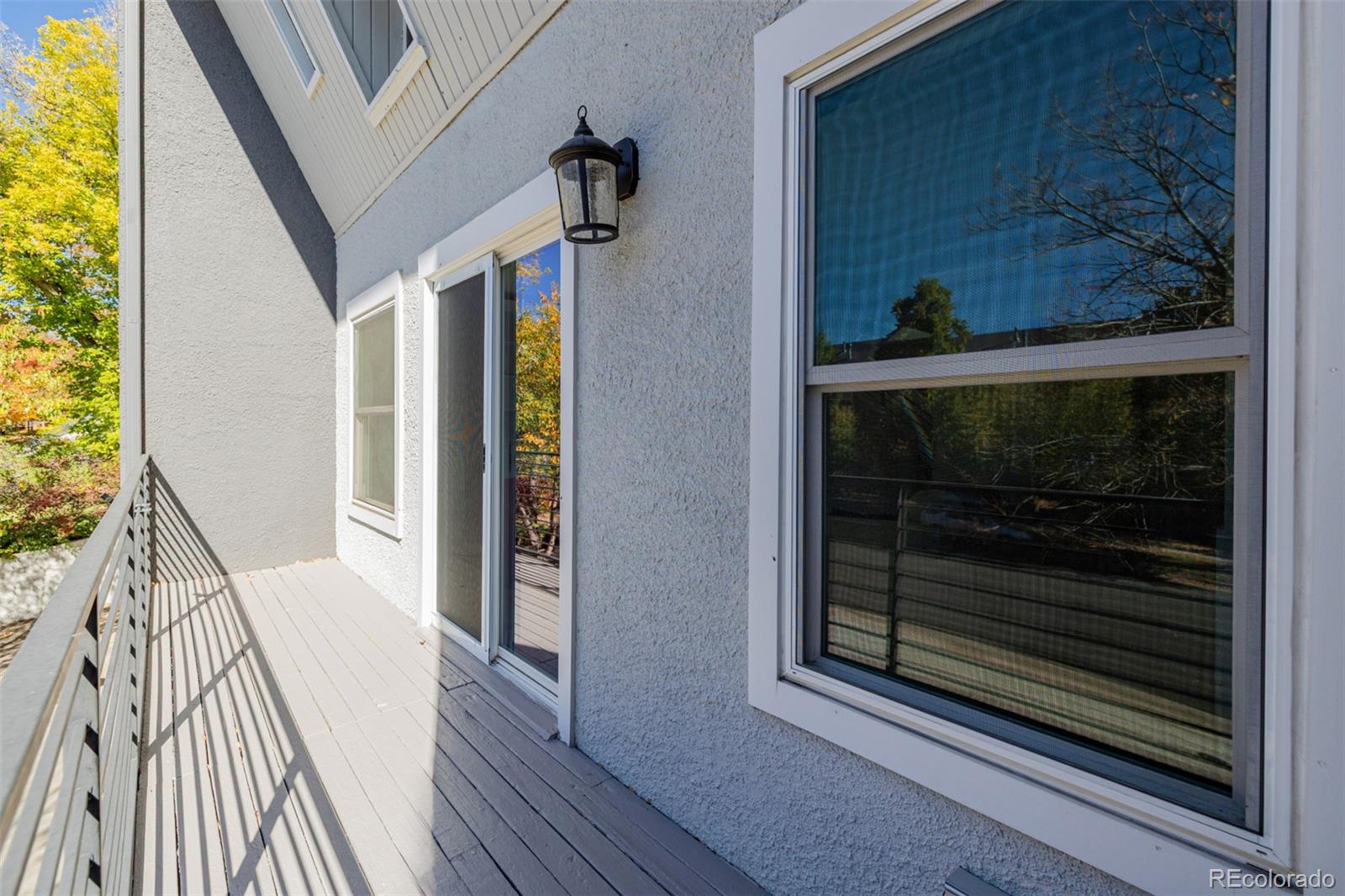 12 Jackson Street Denver, CO 80206 - Photo 29 of 48 a view of a hallway with wooden floor and staircase