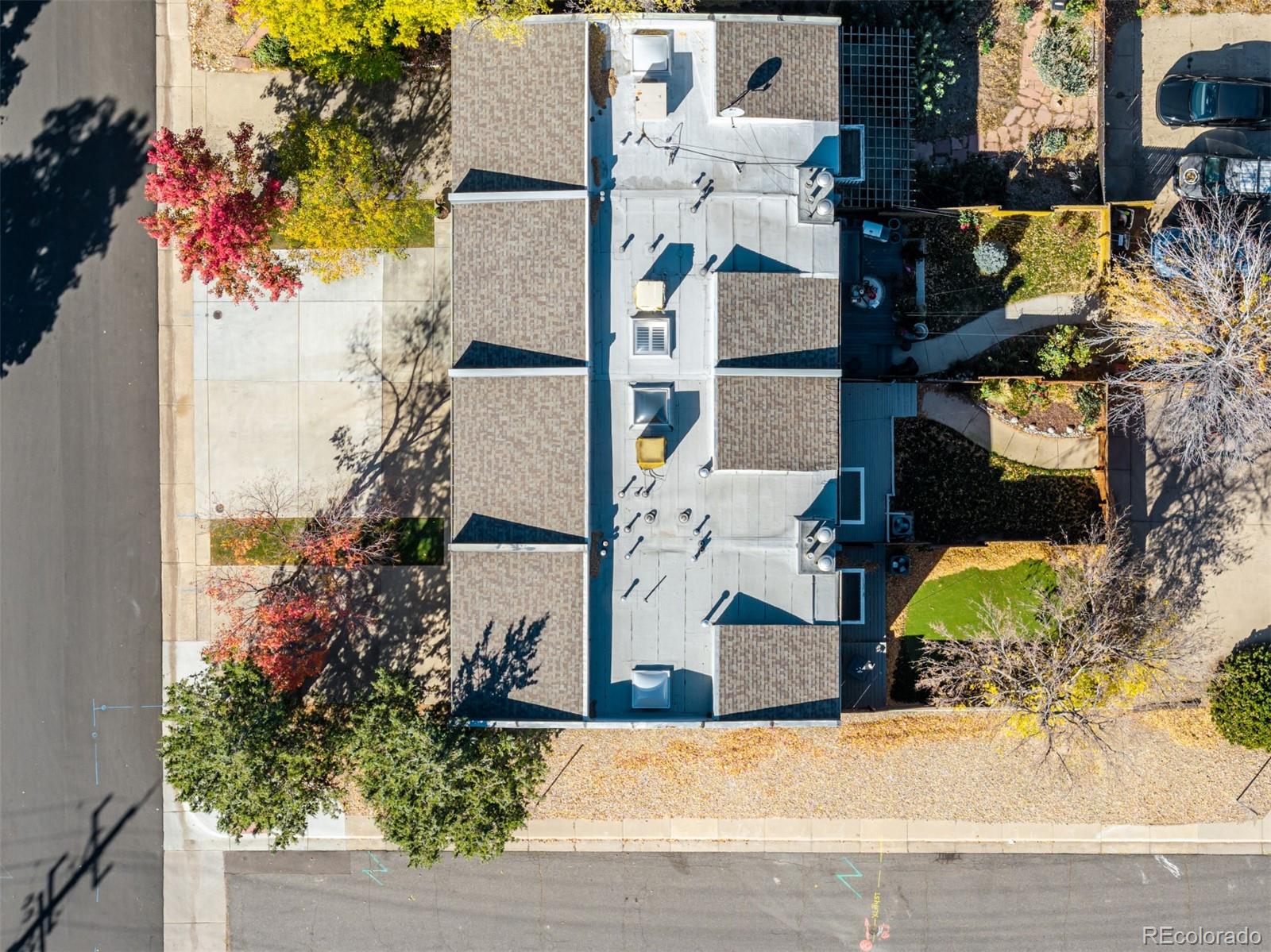 12 Jackson Street Denver, CO 80206 - Photo 40 of 48 an aerial view of houses with trees