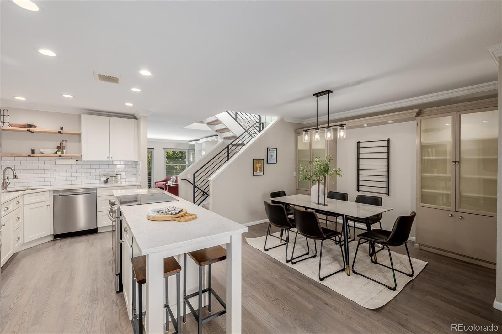 12 Jackson Street Denver, CO 80206 - Photo 5 of 48 a dining room with furniture and window