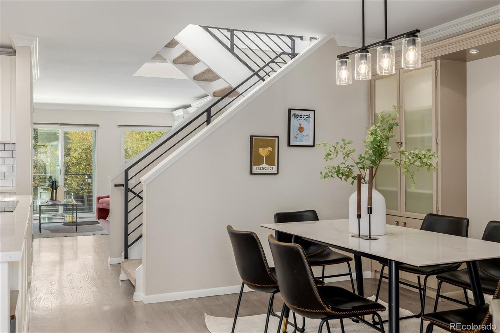 12 Jackson Street Denver, CO 80206 - Photo 8 of 48 a dining room with furniture and window