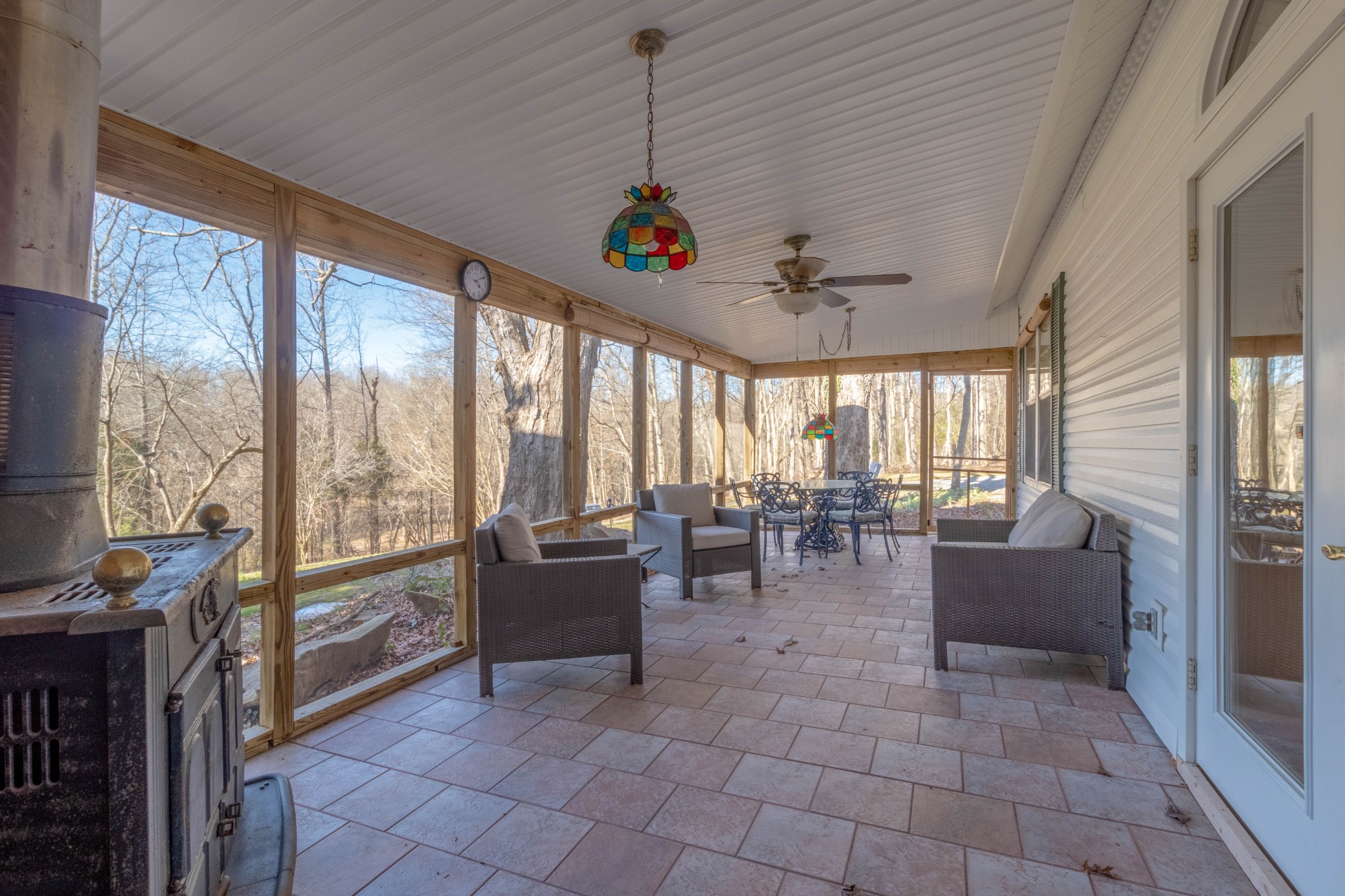 1441 Gratton Road Clarksville, TN 37043 - Photo 15 of 49 a living room with furniture a large window and chandelier