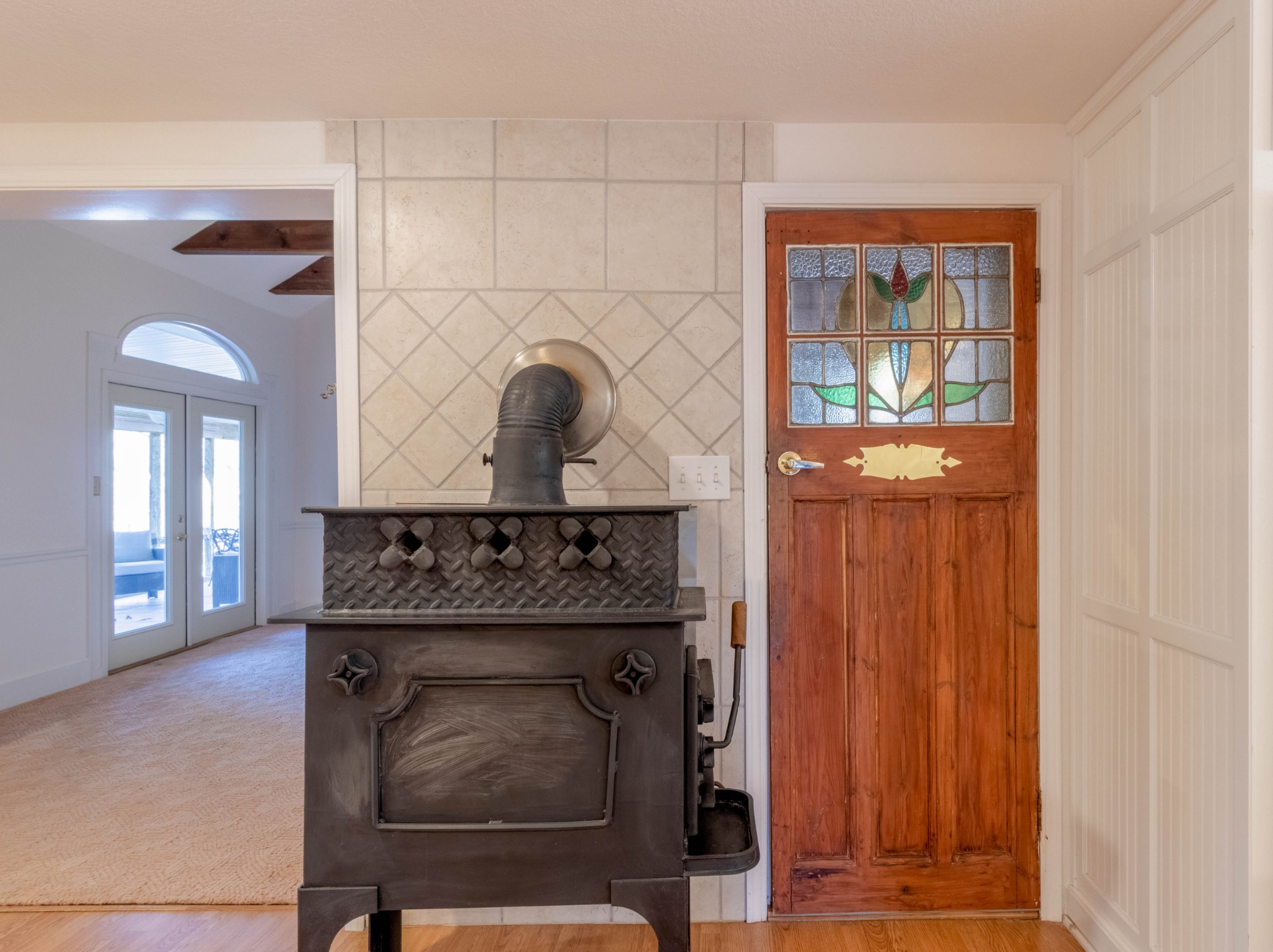1441 Gratton Road Clarksville, TN 37043 - Photo 19 of 49 a room with a fireplace and a wooden floor