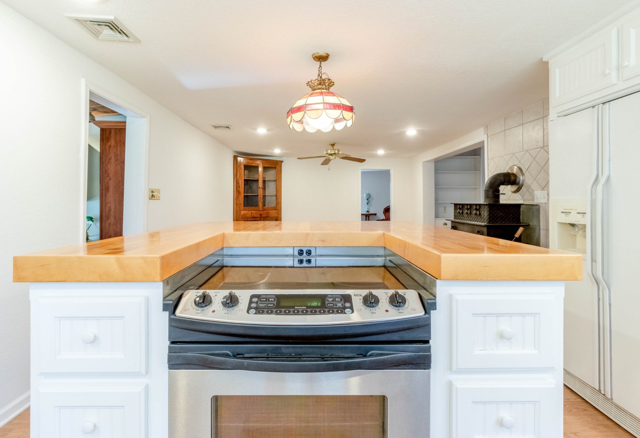 1441 Gratton Road Clarksville, TN 37043 - Photo 23 of 49 a kitchen view with fireplace a chandelier and living room view