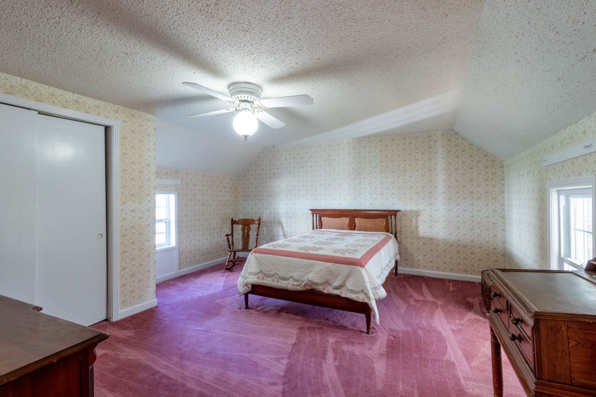 1441 Gratton Road Clarksville, TN 37043 - Photo 35 of 49 a bedroom with a bed and a chandelier