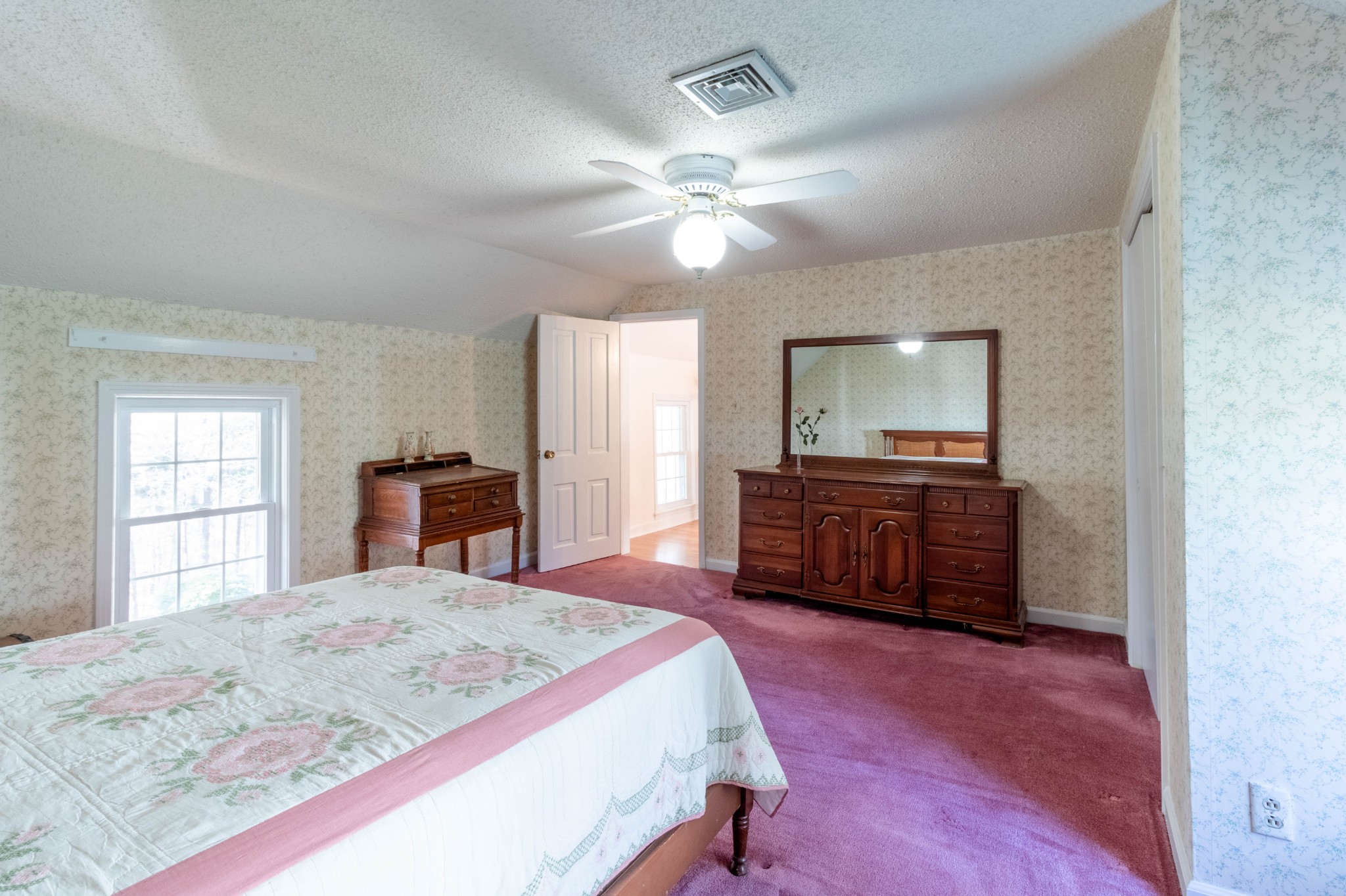 1441 Gratton Road Clarksville, TN 37043 - Photo 36 of 49 a bed room with a bed and a dresser