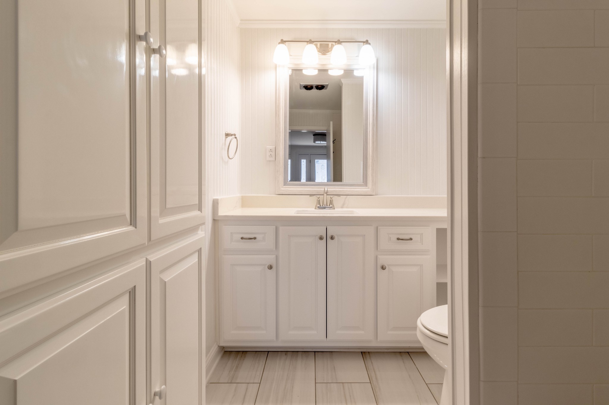 1441 Gratton Road Clarksville, TN 37043 - Photo 8 of 49 a bathroom with a toilet a sink and a mirror