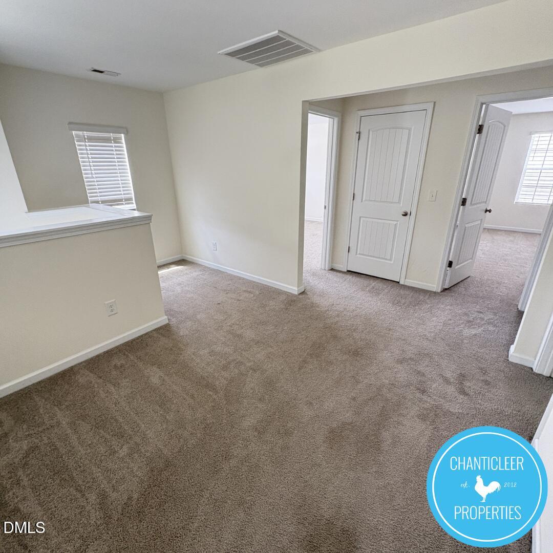 3318 Slippery Elm Drive Raleigh, NC 27610 - Photo 12 of 25 a view of an empty room with a window