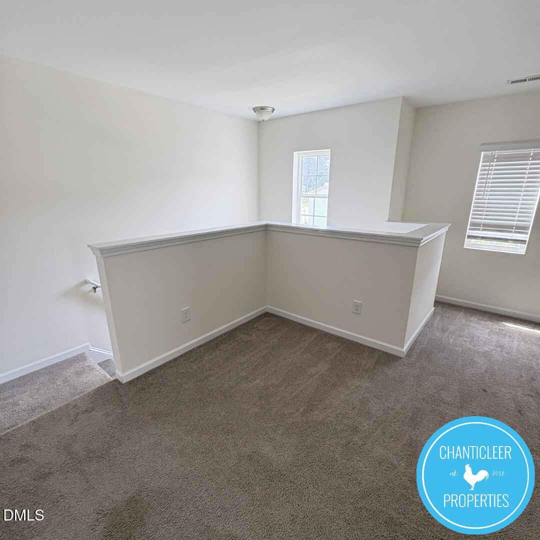 3318 Slippery Elm Drive Raleigh, NC 27610 - Photo 13 of 25 an empty room with a window