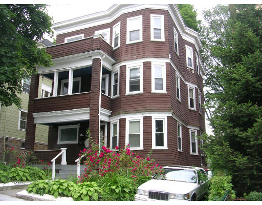 81 Montebello Road Boston, MA 02130 - Photo 1 of 9 front view of a brick house with a yard