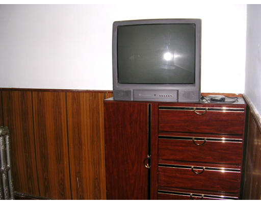 81 Montebello Road Boston, MA 02130 - Photo 5 of 9 a room with a flat screen tv