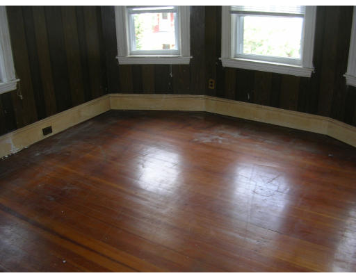 81 Montebello Road Boston, MA 02130 - Photo 8 of 9 an empty room with wooden floor and windows