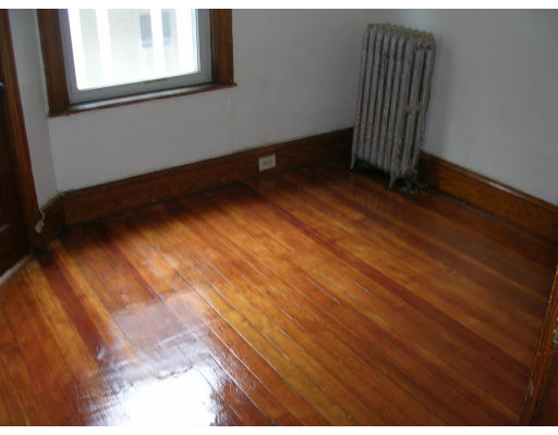 81 Montebello Road Boston, MA 02130 - Photo 9 of 9 a view of a room has wooden floor and a window