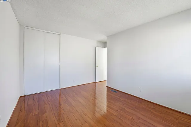 a view of a backyard with sitting area