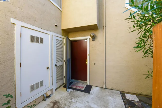 a view of a bathroom with a shower and a sink