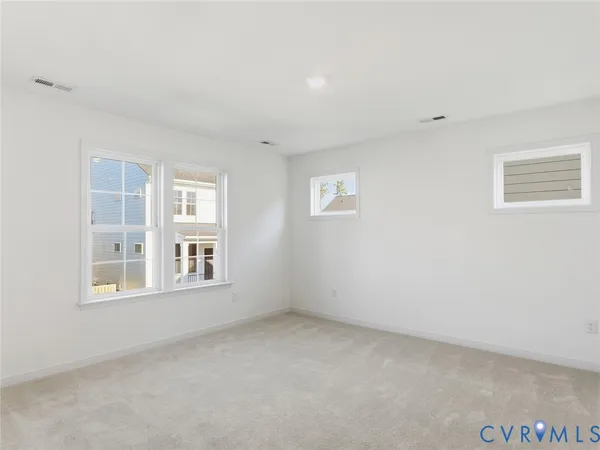 an empty room with windows