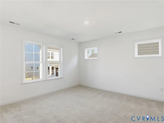 an empty room with windows