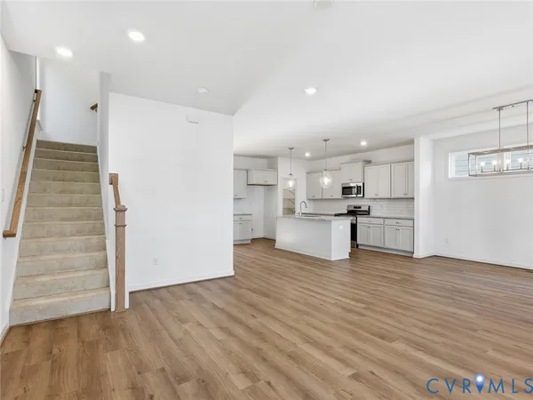 a view of kitchen with wooden floor