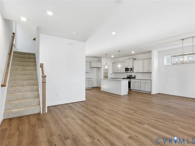 a view of kitchen with wooden floor