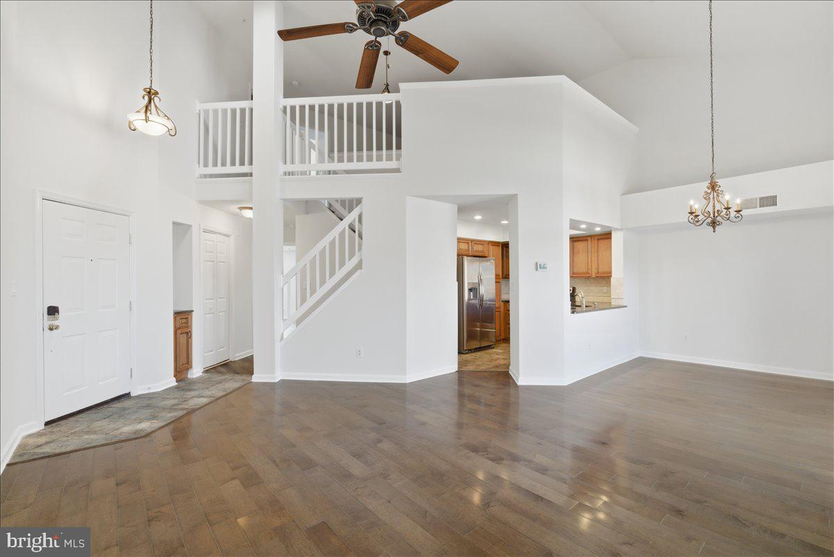 1304 F Garden Wall Circle Reston, VA 20194 - Photo 5 of 23 an empty room with windows and fireplace