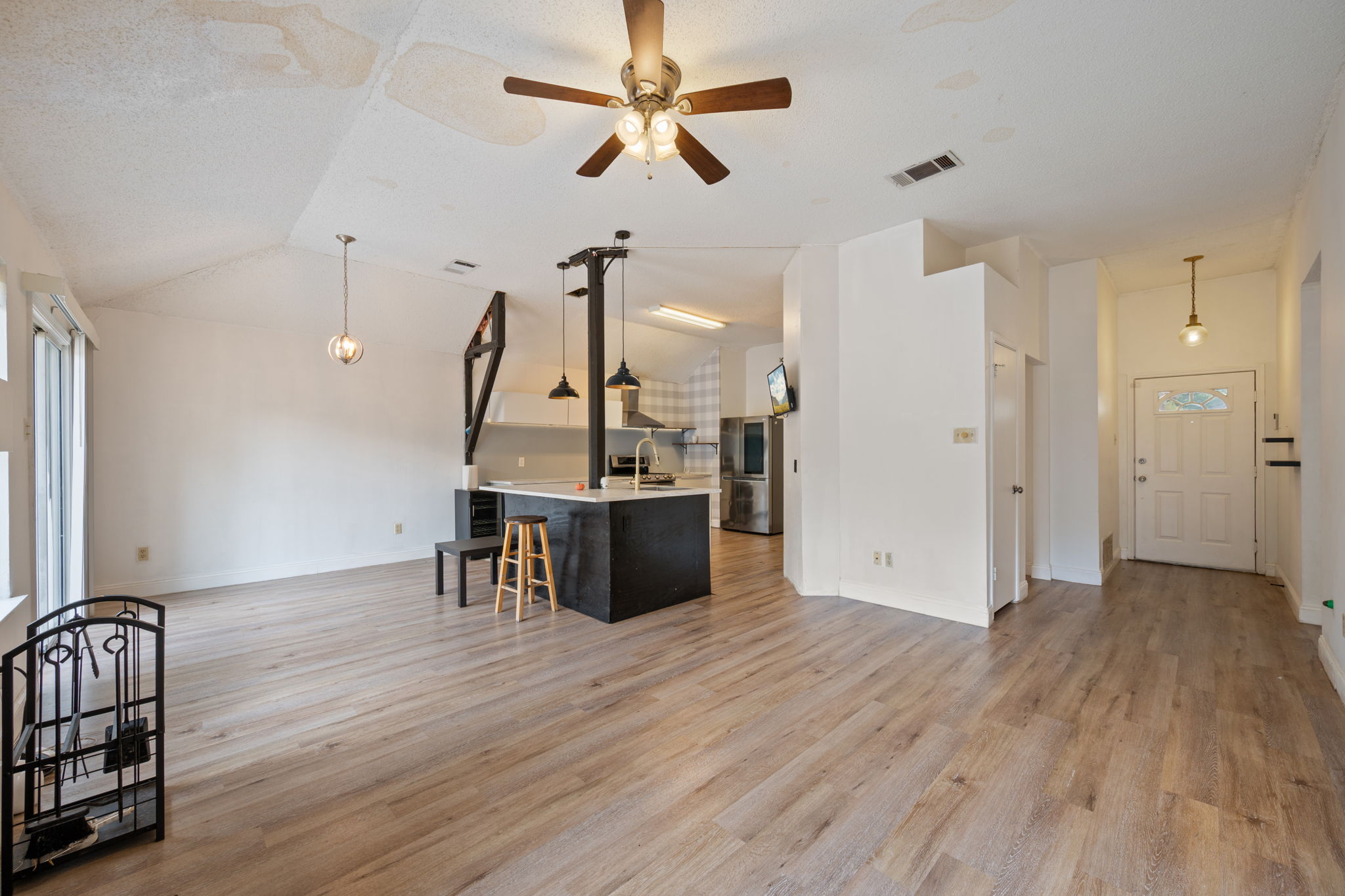 12501 Fallen Tower Lane Austin, TX 78753 - Photo 5 of 31 a view of a room with wooden floor and ceiling fan