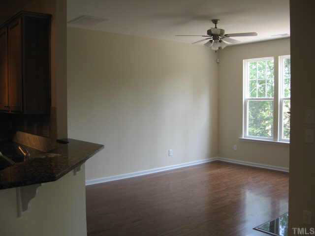 4709 Kings Garden Road Raleigh, NC 27612 - Photo 8 of 10 Living Room w/fireplace and TV niche